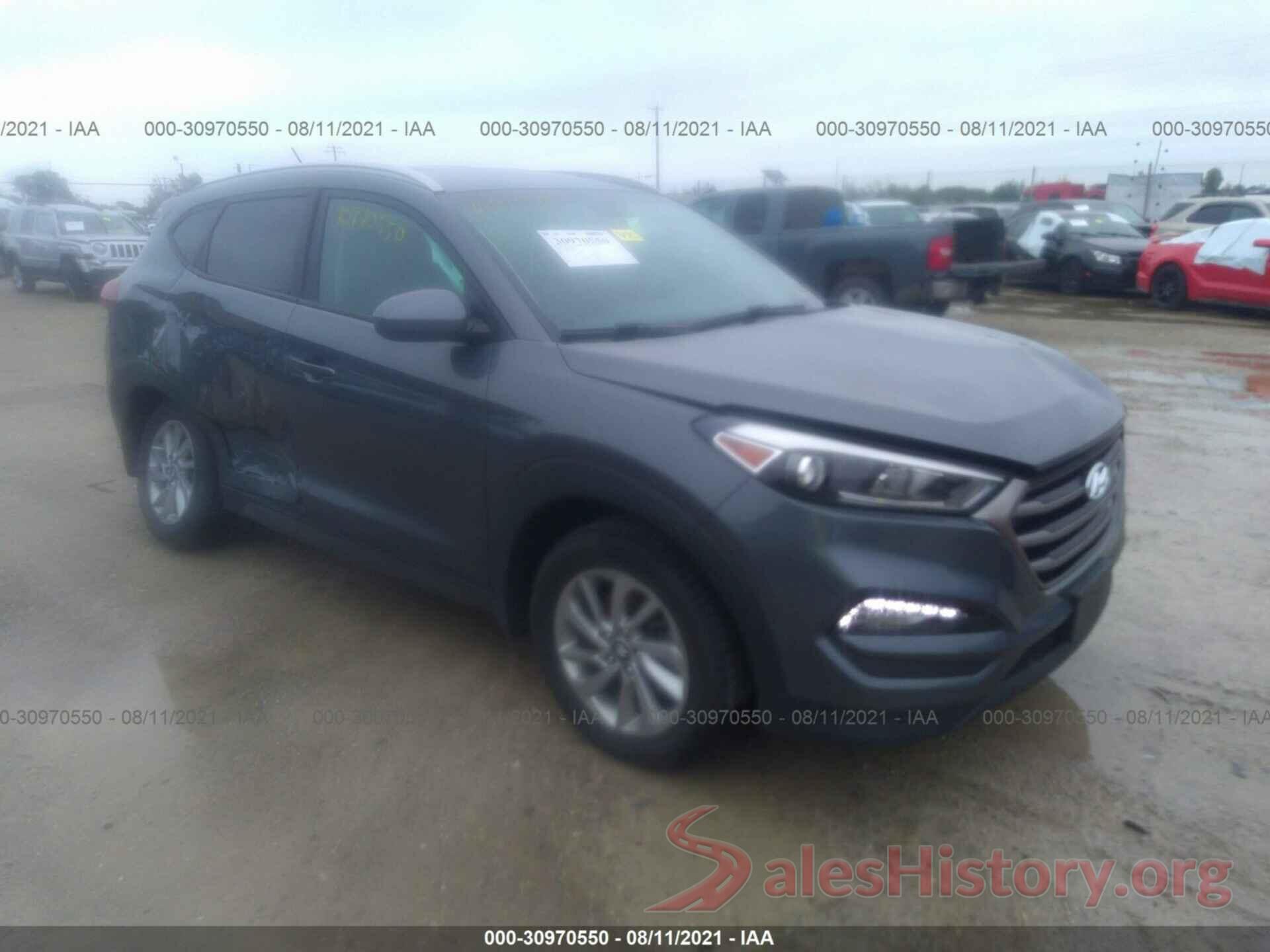 KM8J3CA42GU227381 2016 HYUNDAI TUCSON