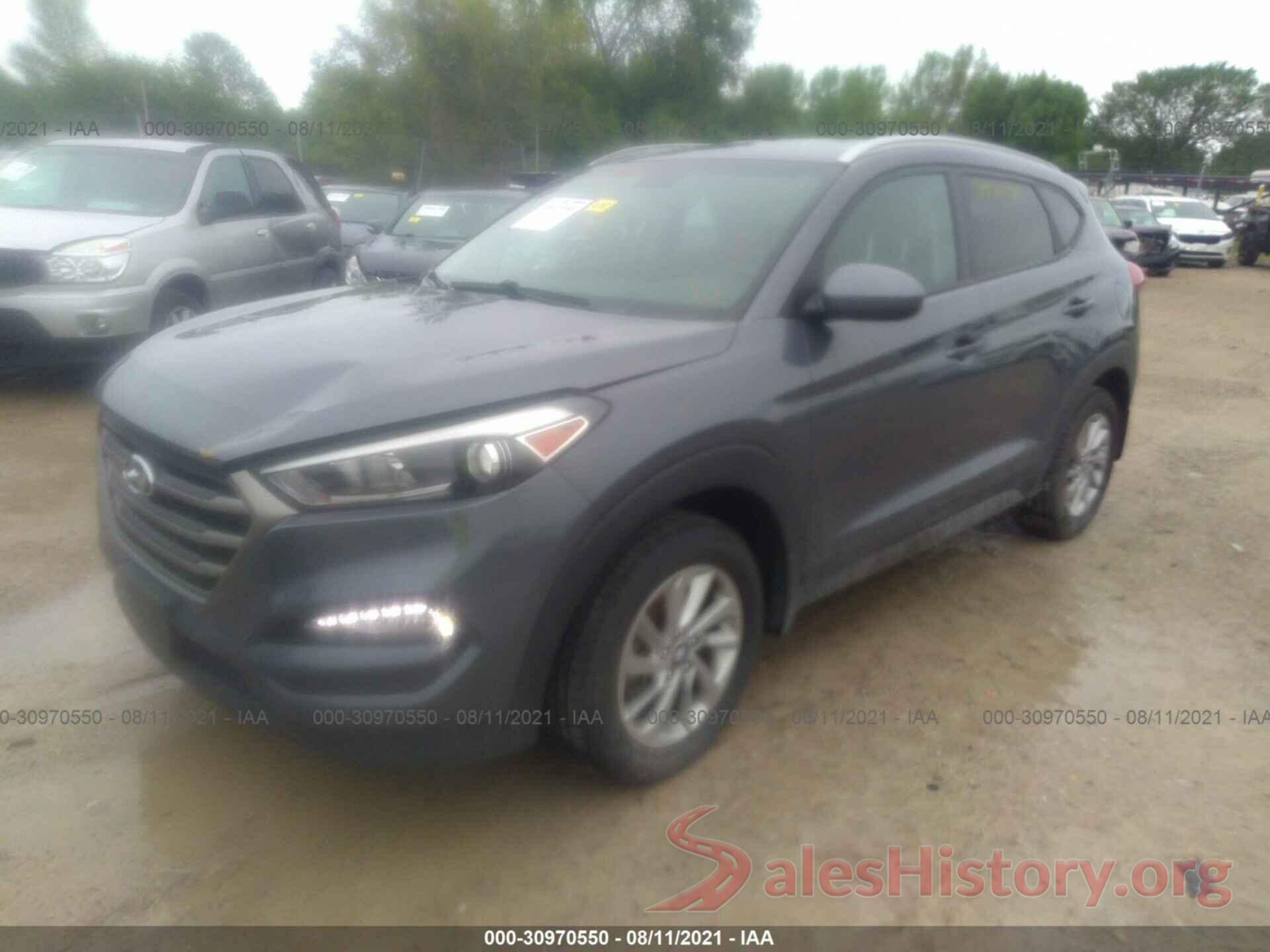 KM8J3CA42GU227381 2016 HYUNDAI TUCSON