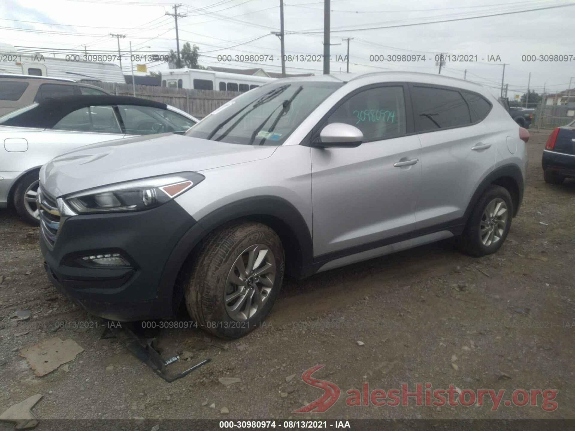 KM8J3CA46JU714977 2018 HYUNDAI TUCSON