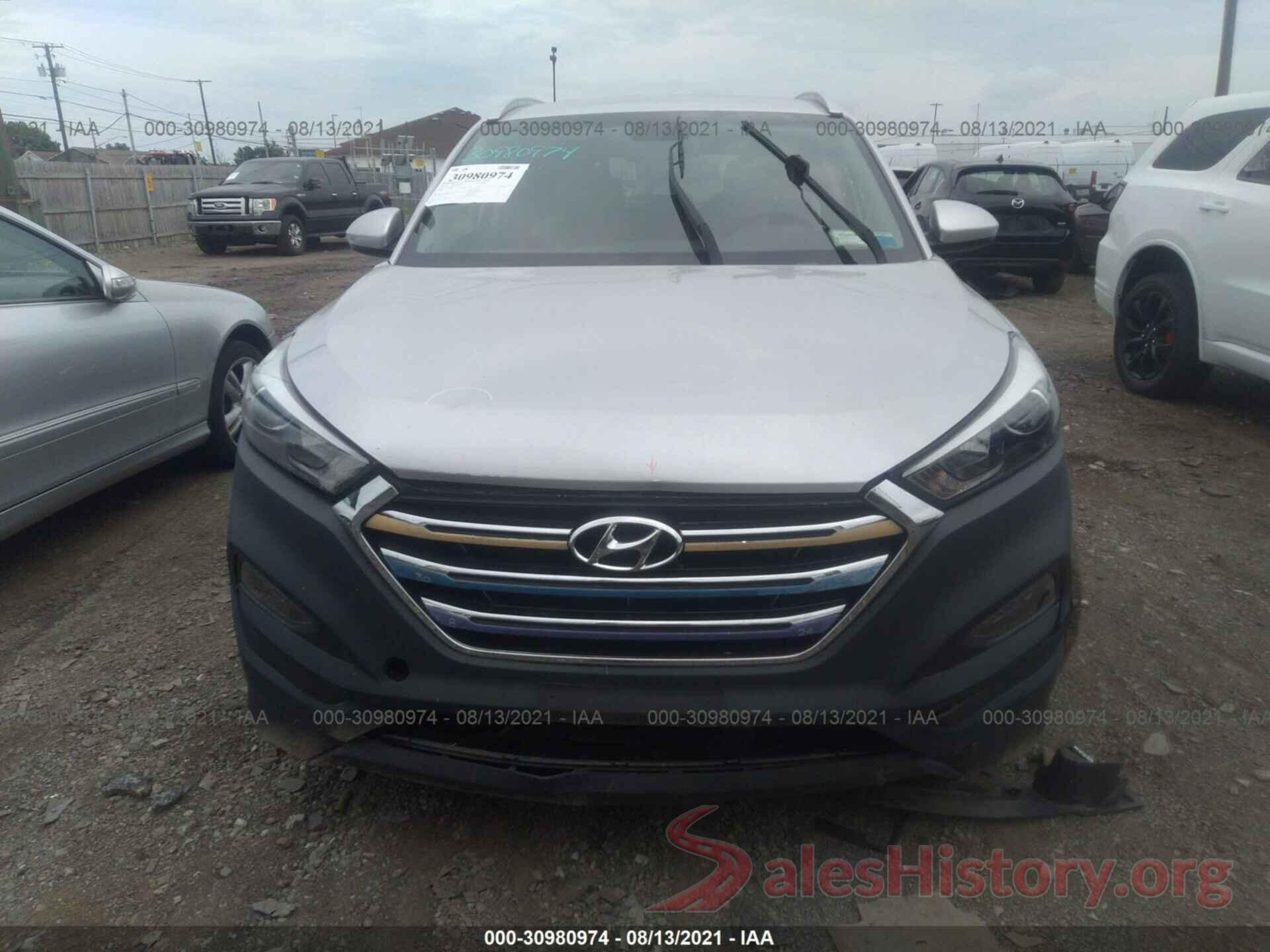 KM8J3CA46JU714977 2018 HYUNDAI TUCSON