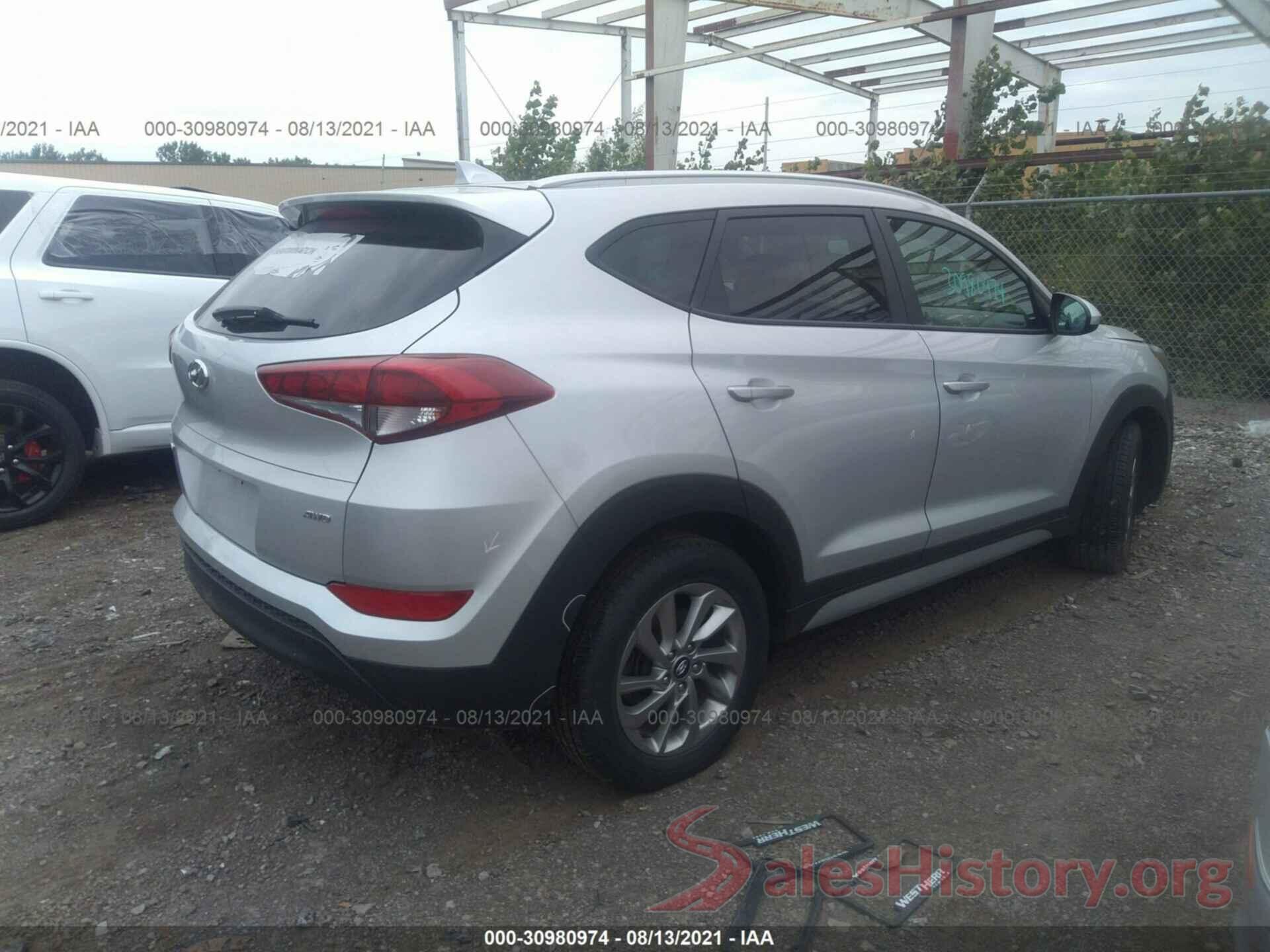 KM8J3CA46JU714977 2018 HYUNDAI TUCSON