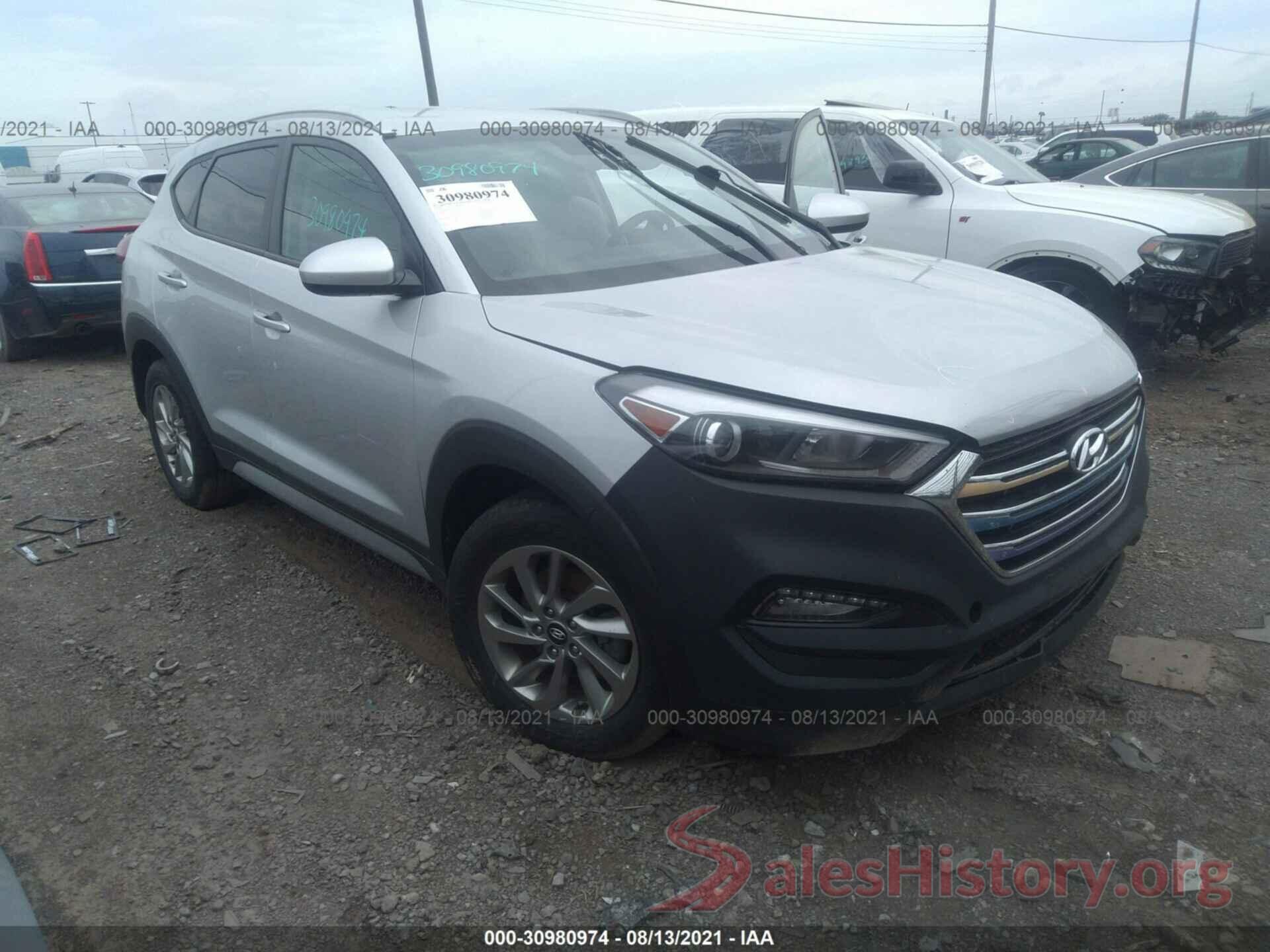 KM8J3CA46JU714977 2018 HYUNDAI TUCSON