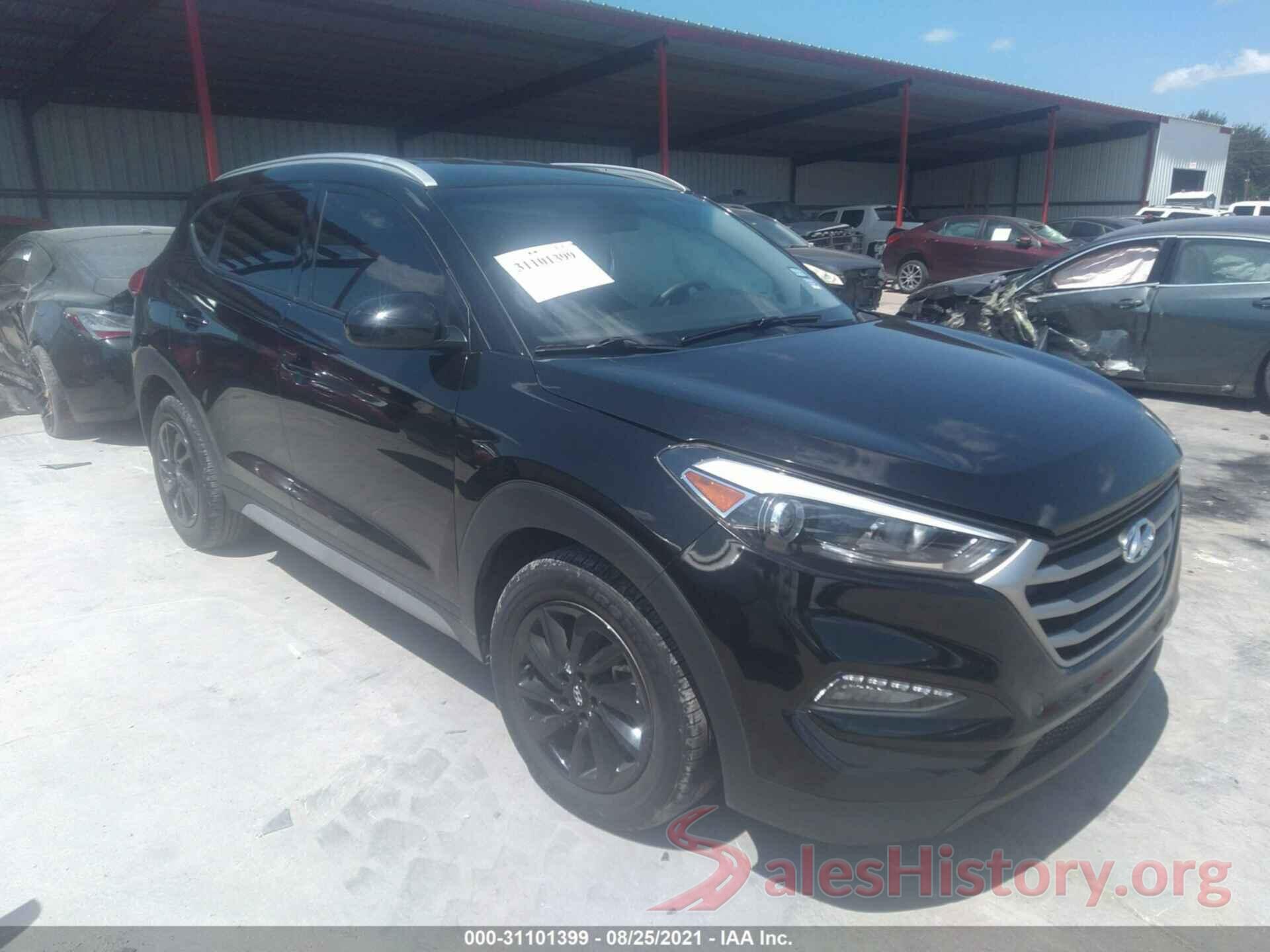 KM8J3CA43JU769676 2018 HYUNDAI TUCSON