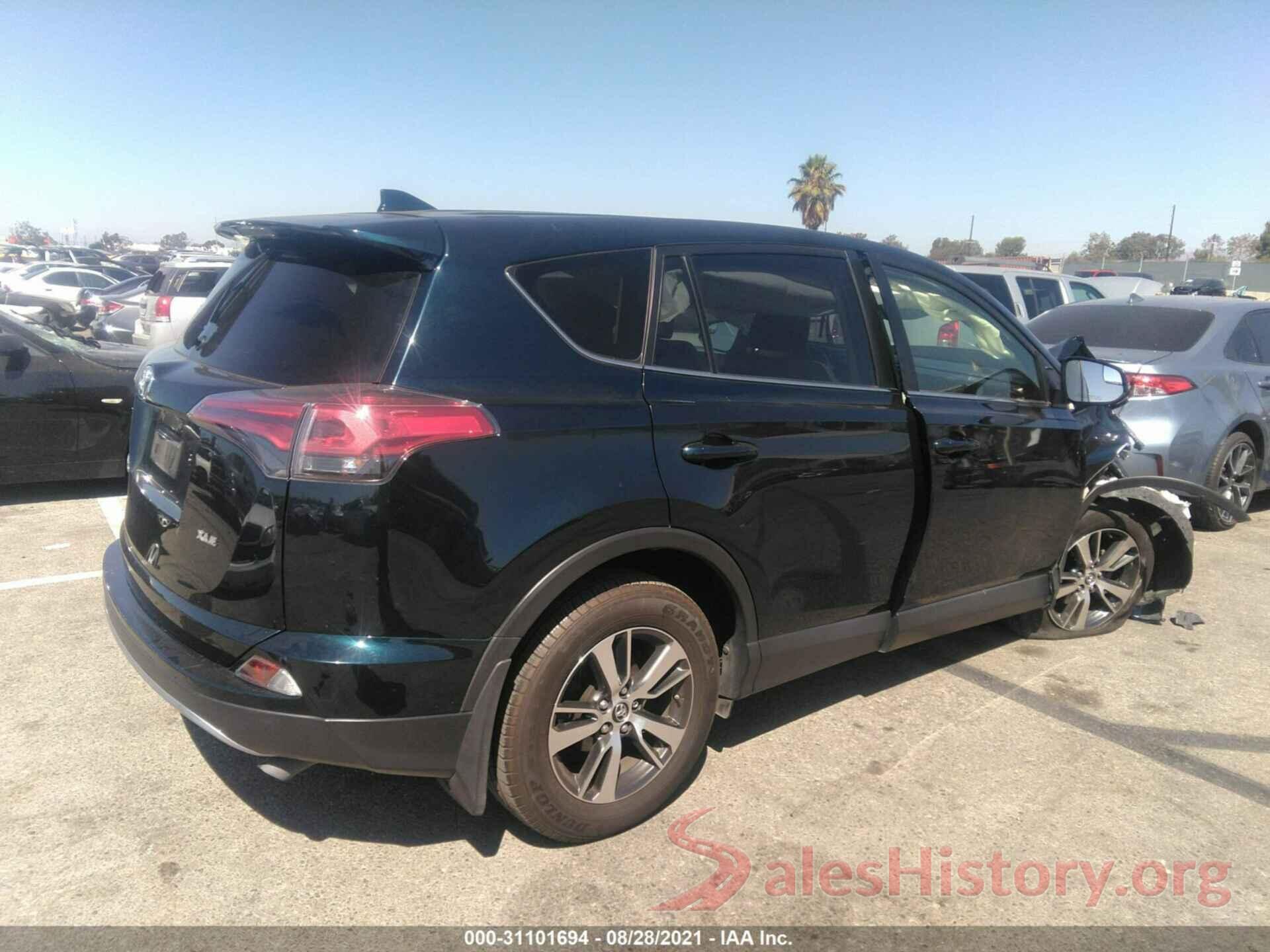 JTMWFREV1JJ731002 2018 TOYOTA RAV4