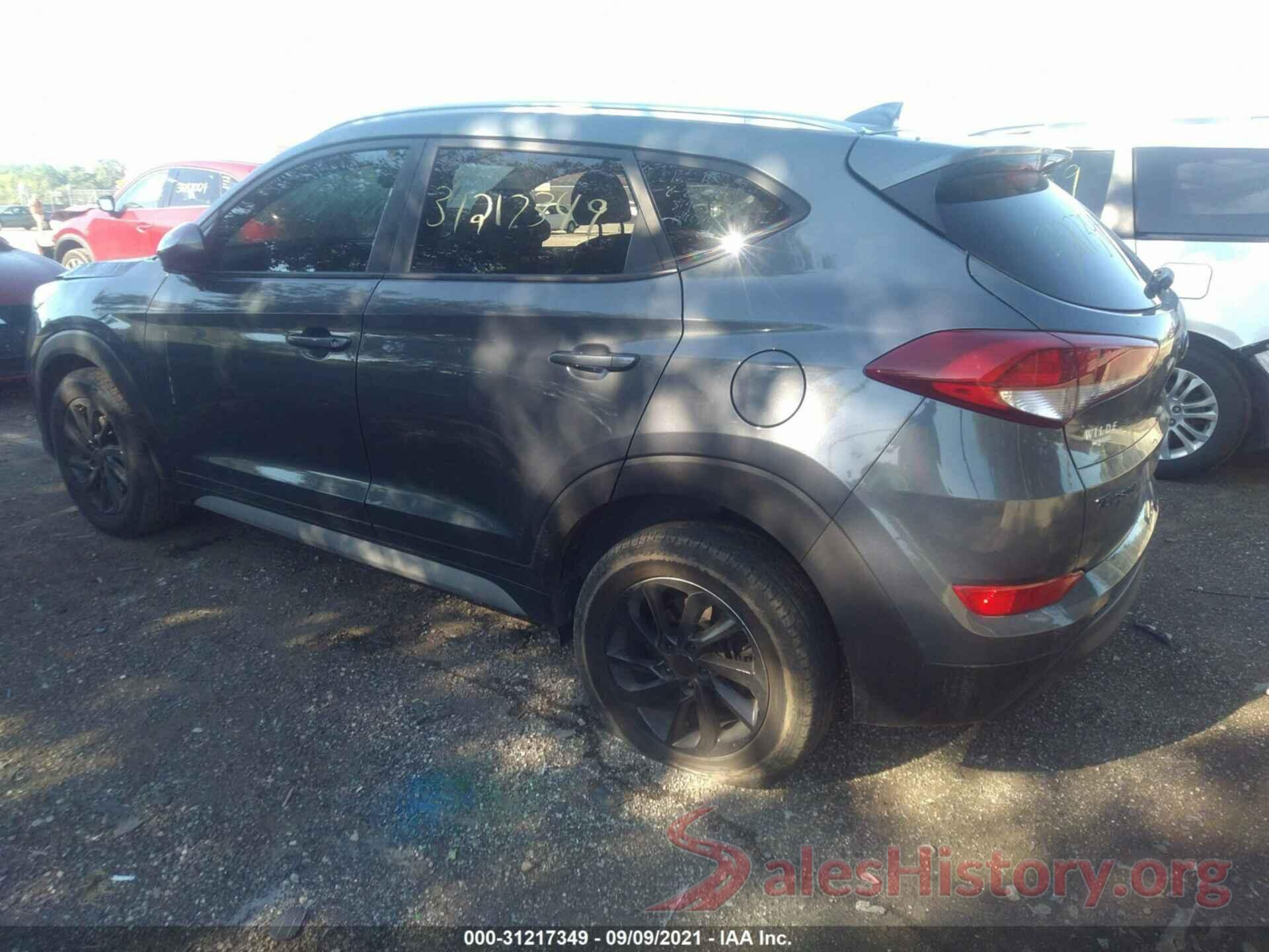 KM8J3CA48JU721056 2018 HYUNDAI TUCSON