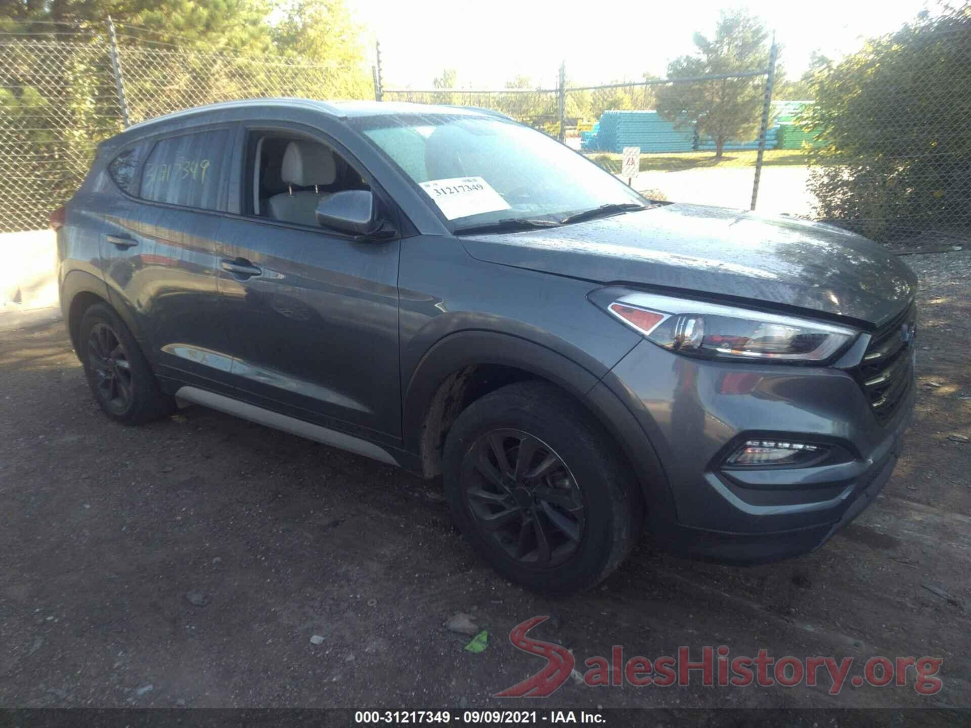 KM8J3CA48JU721056 2018 HYUNDAI TUCSON