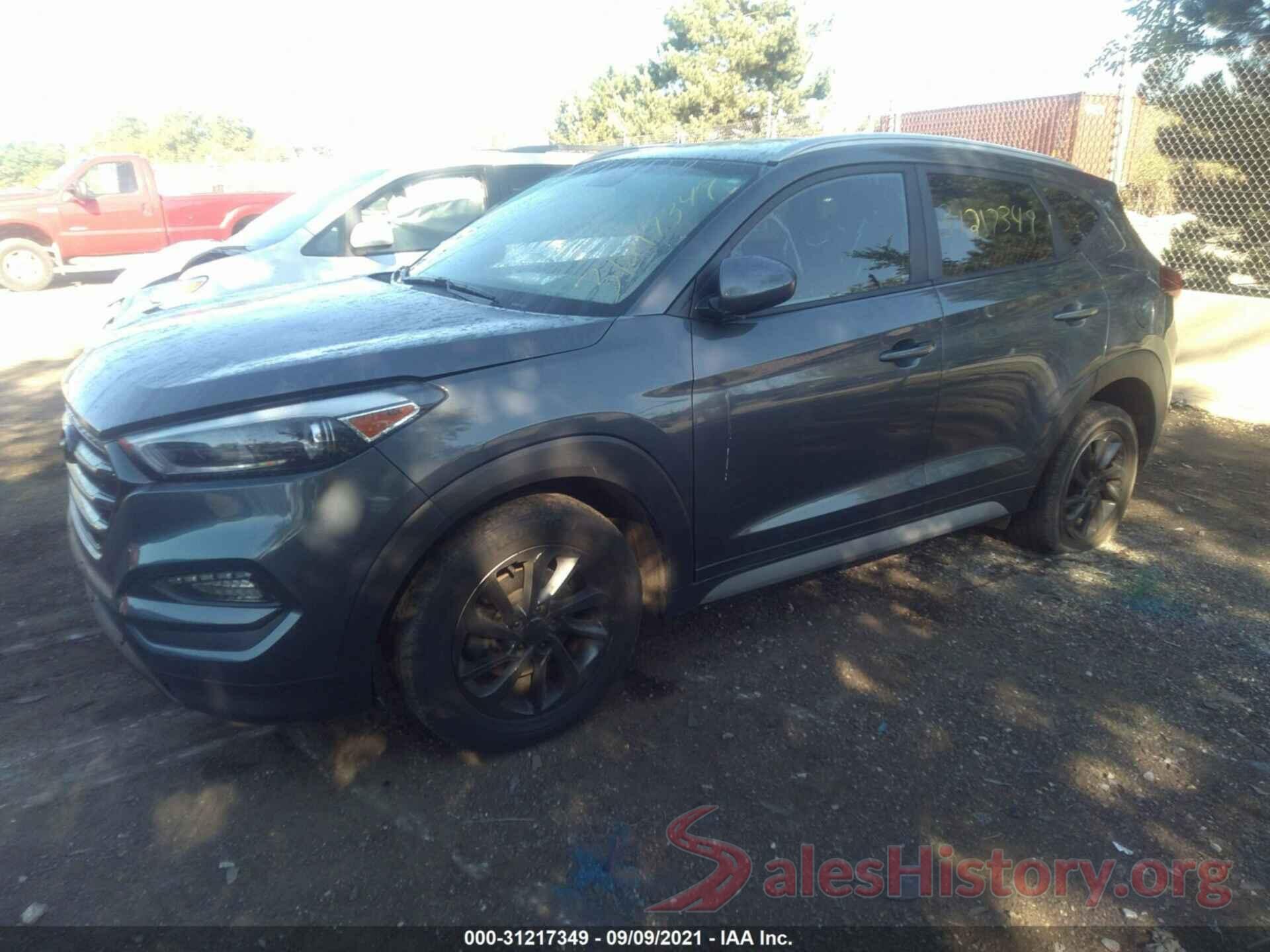 KM8J3CA48JU721056 2018 HYUNDAI TUCSON