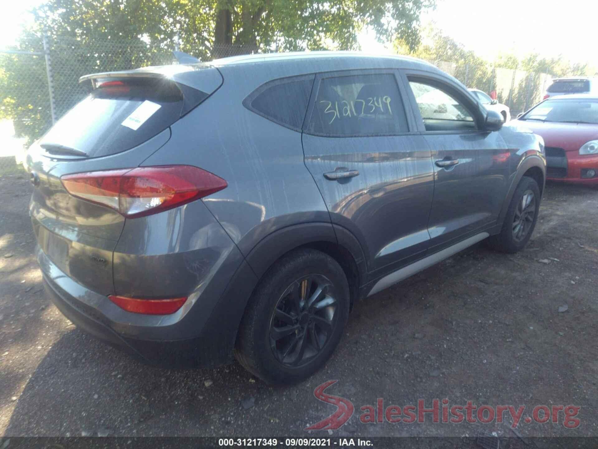 KM8J3CA48JU721056 2018 HYUNDAI TUCSON