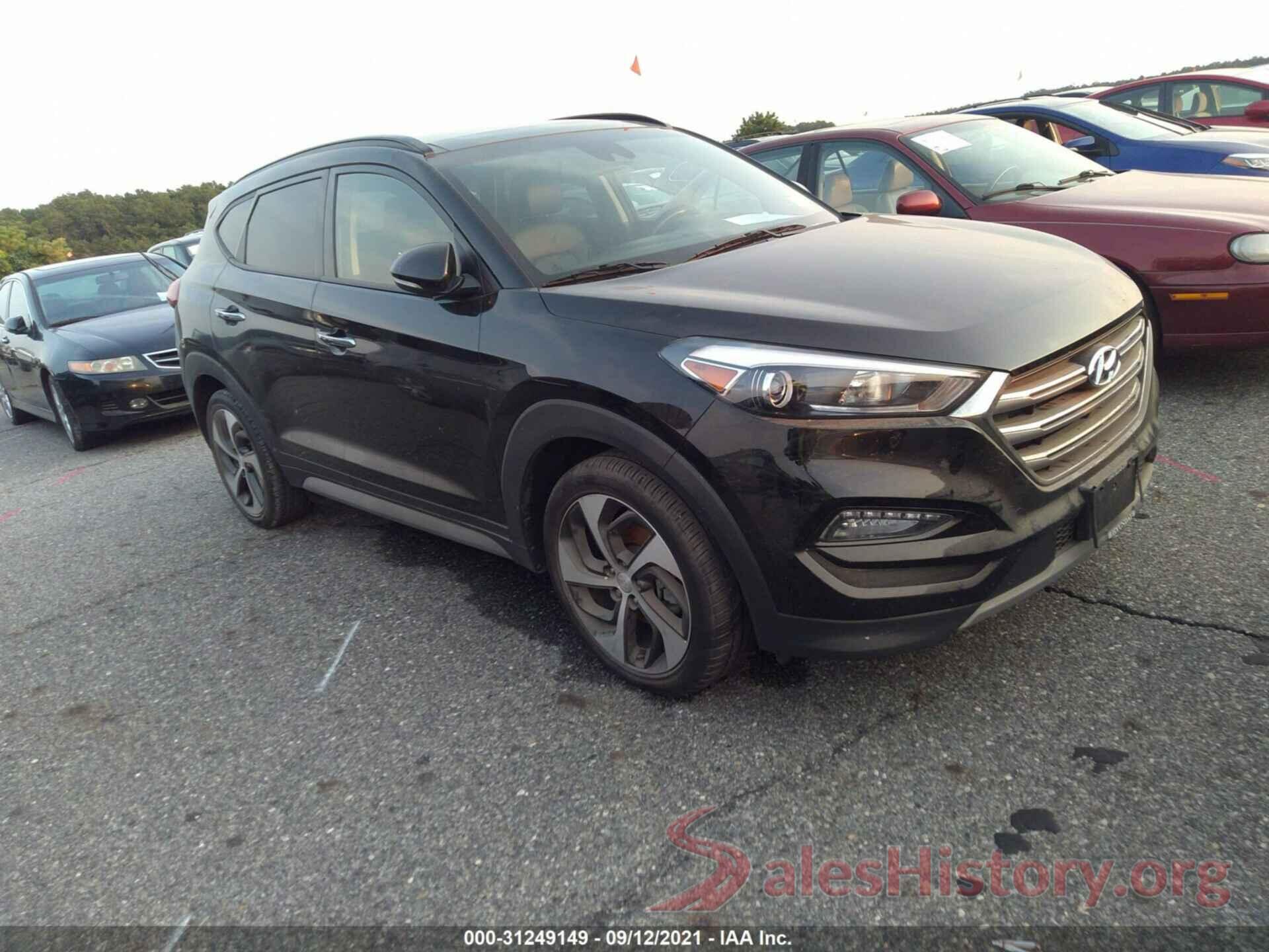 KM8J3CA28JU627614 2018 HYUNDAI TUCSON