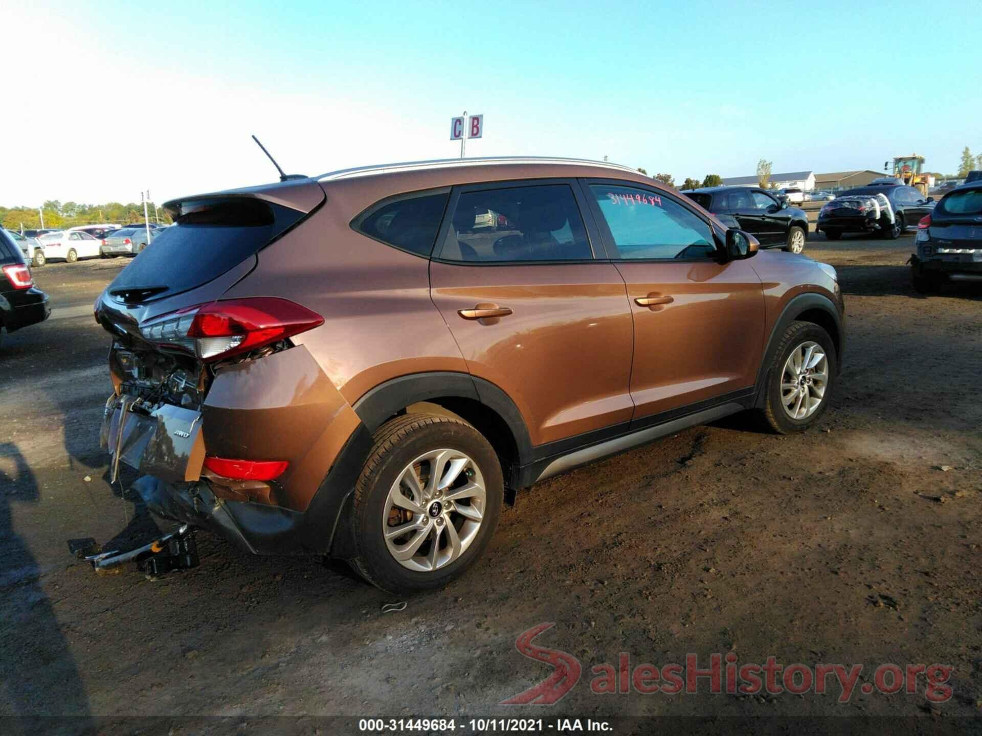 KM8J3CA4XGU242694 2016 HYUNDAI TUCSON