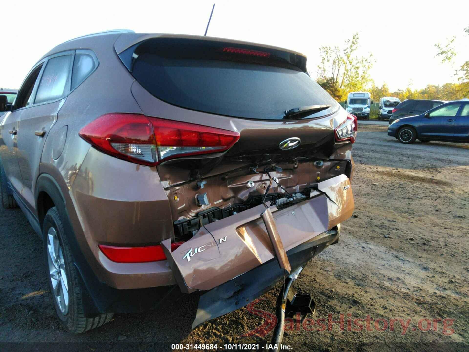 KM8J3CA4XGU242694 2016 HYUNDAI TUCSON