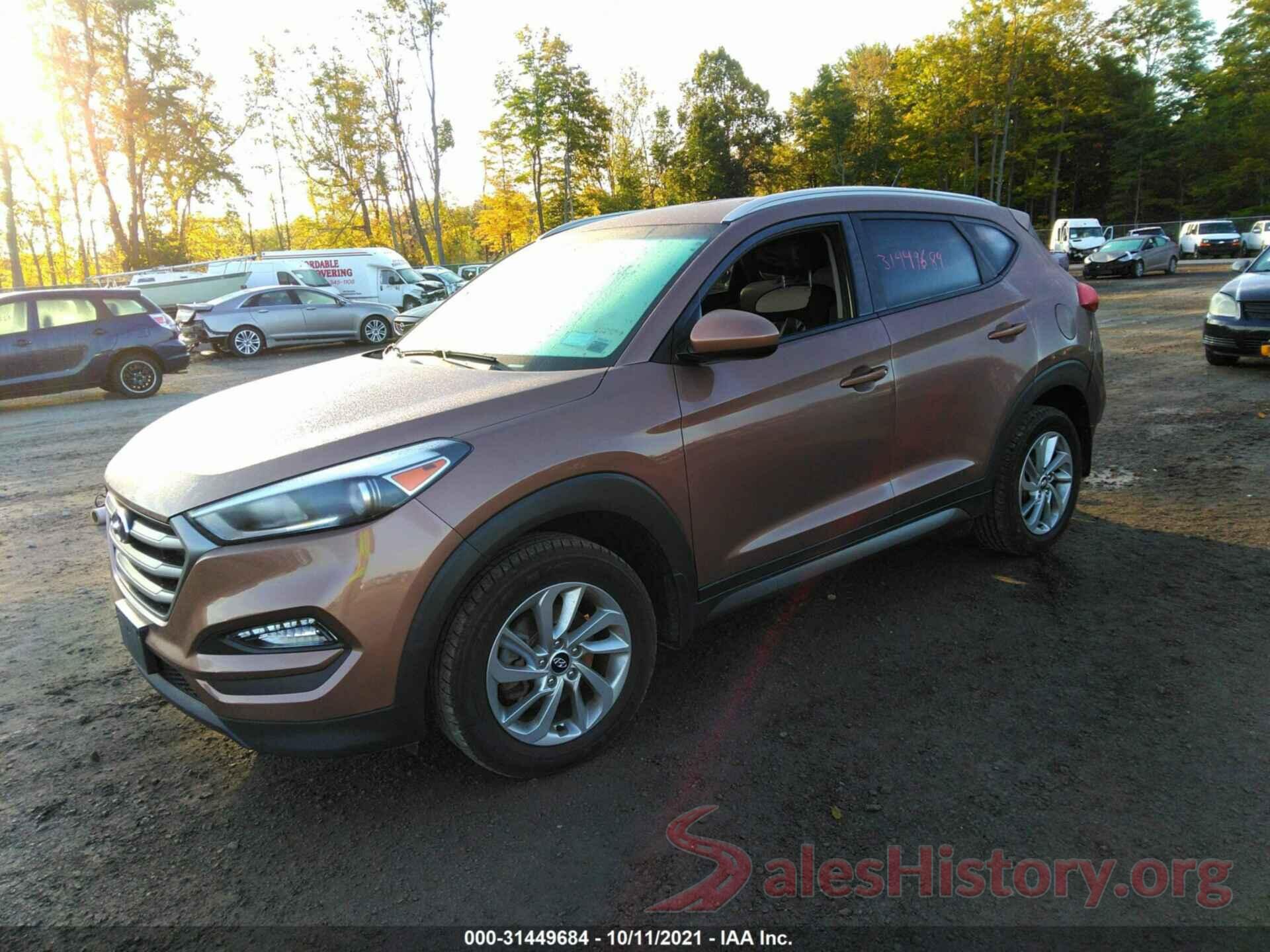 KM8J3CA4XGU242694 2016 HYUNDAI TUCSON