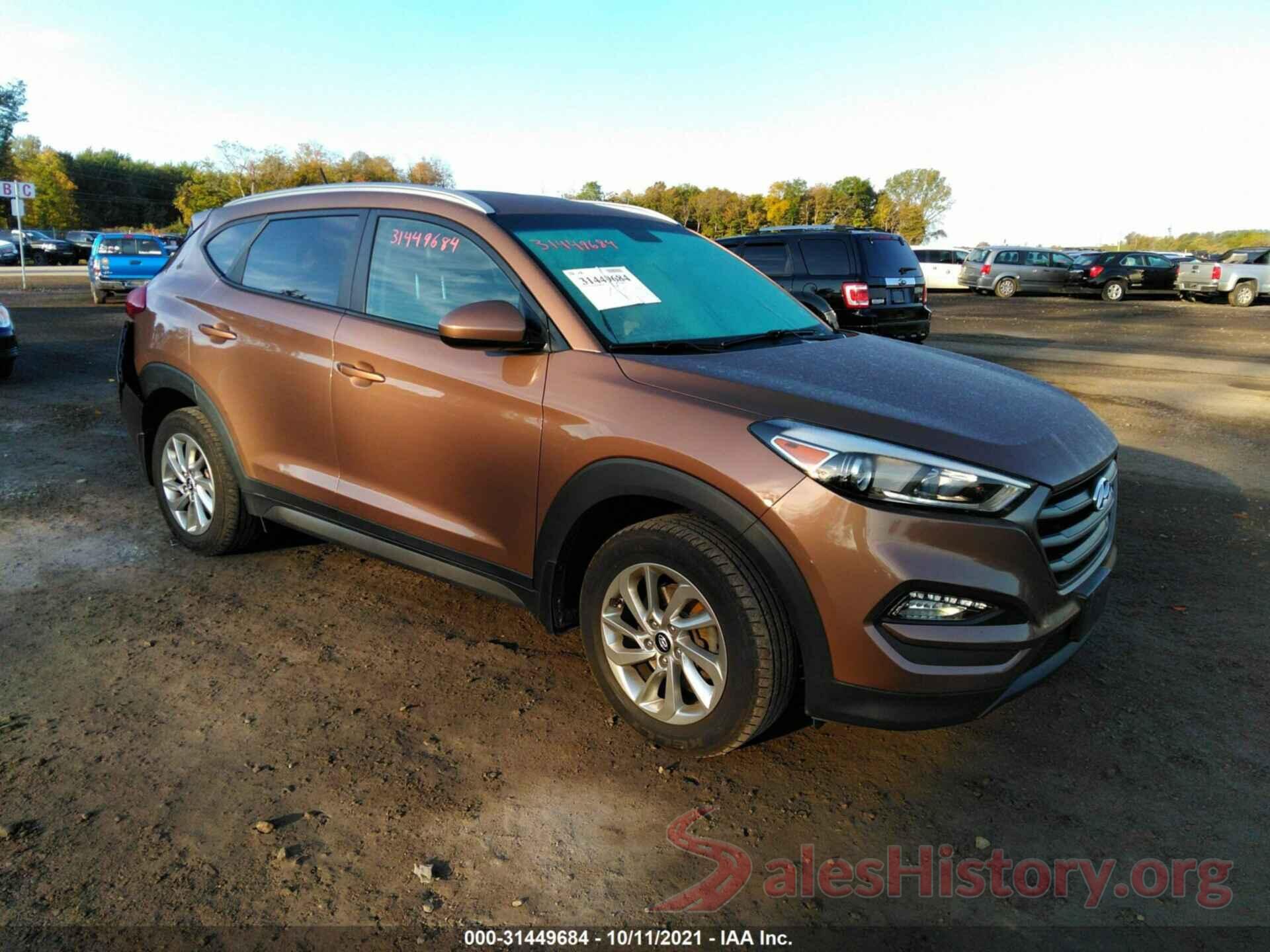 KM8J3CA4XGU242694 2016 HYUNDAI TUCSON