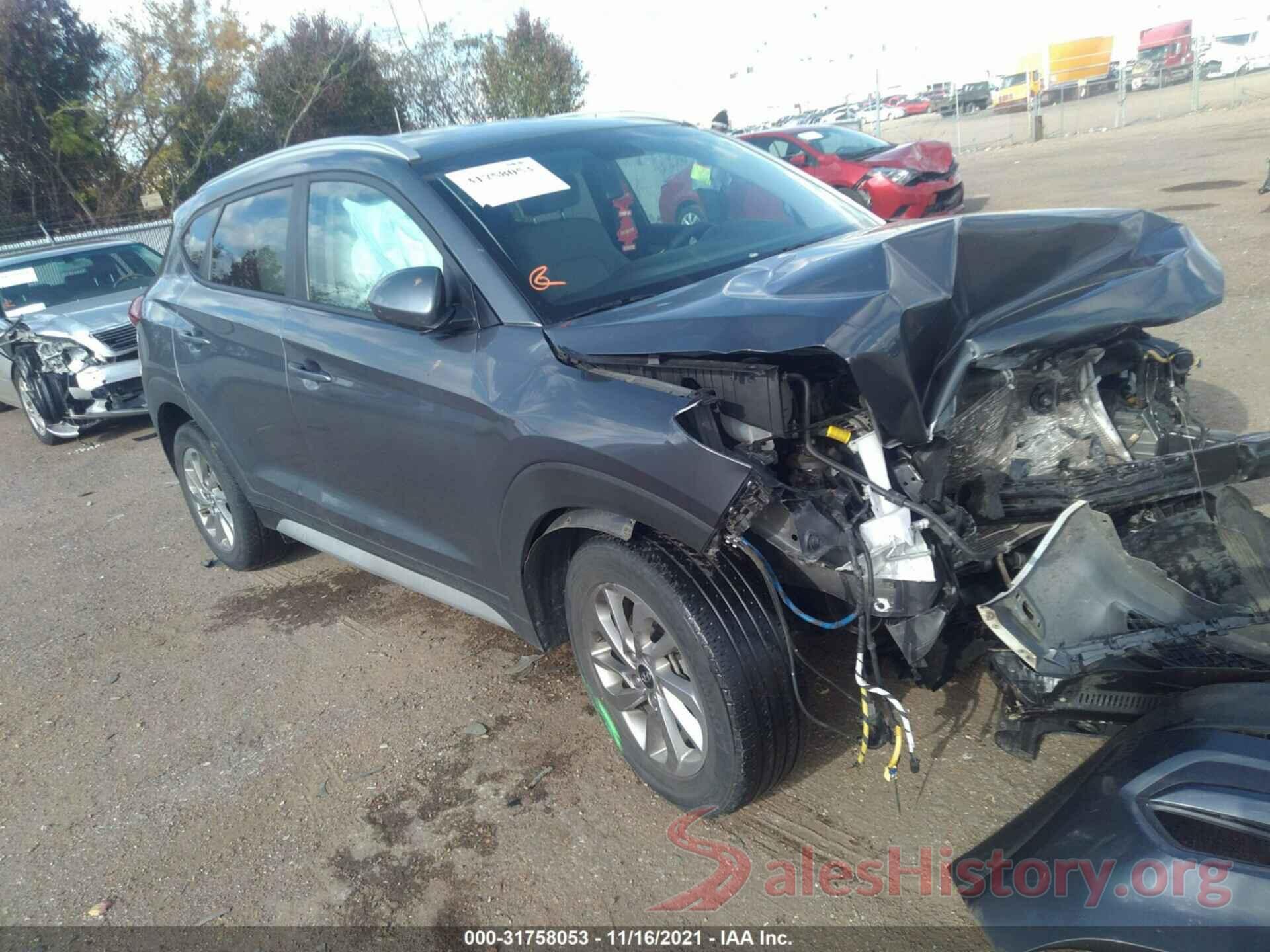 KM8J3CA46JU734226 2018 HYUNDAI TUCSON