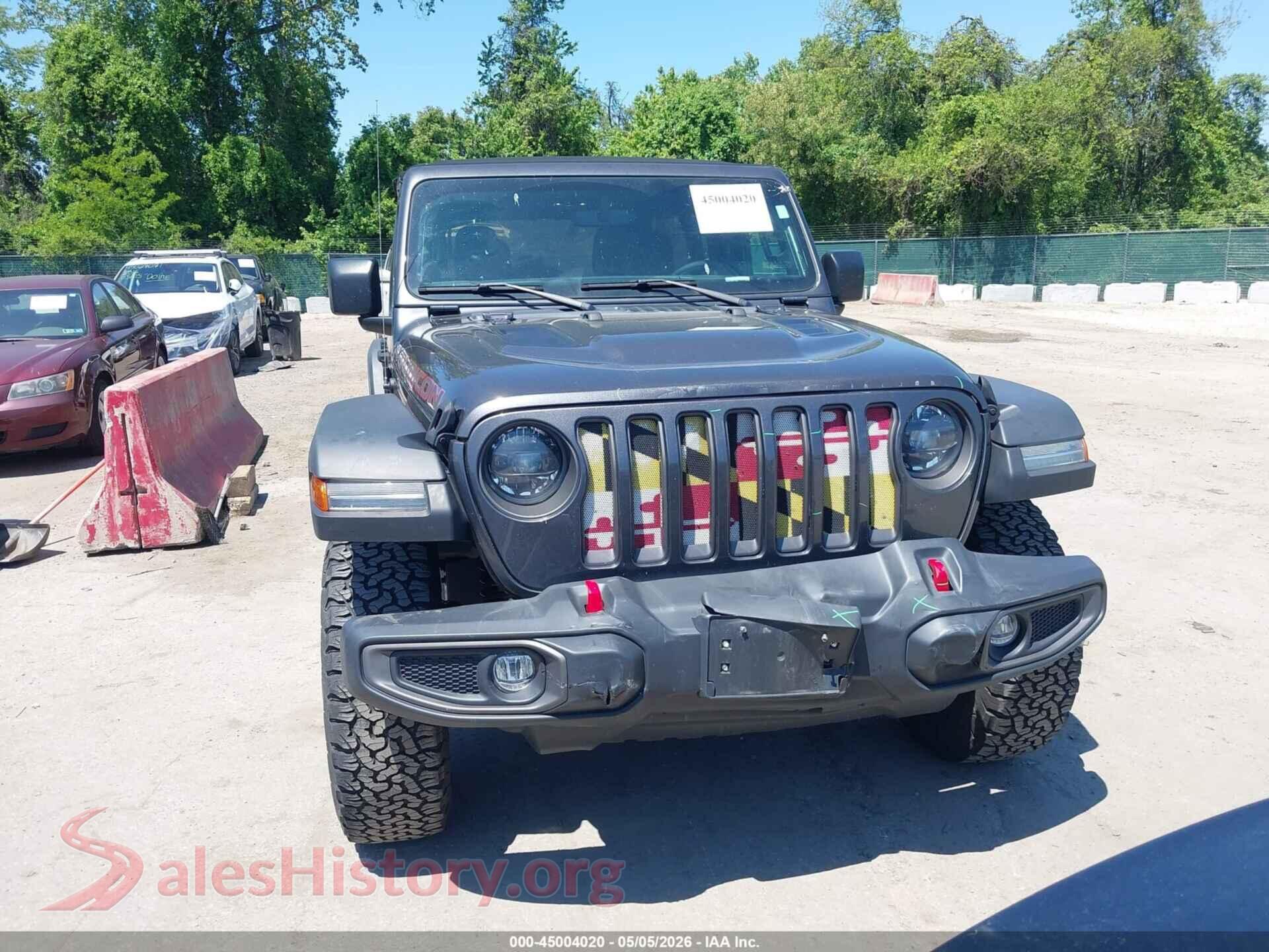 2023 JEEP WRANGLER VIN 1C4HJXFN9PW527599, damage close-up